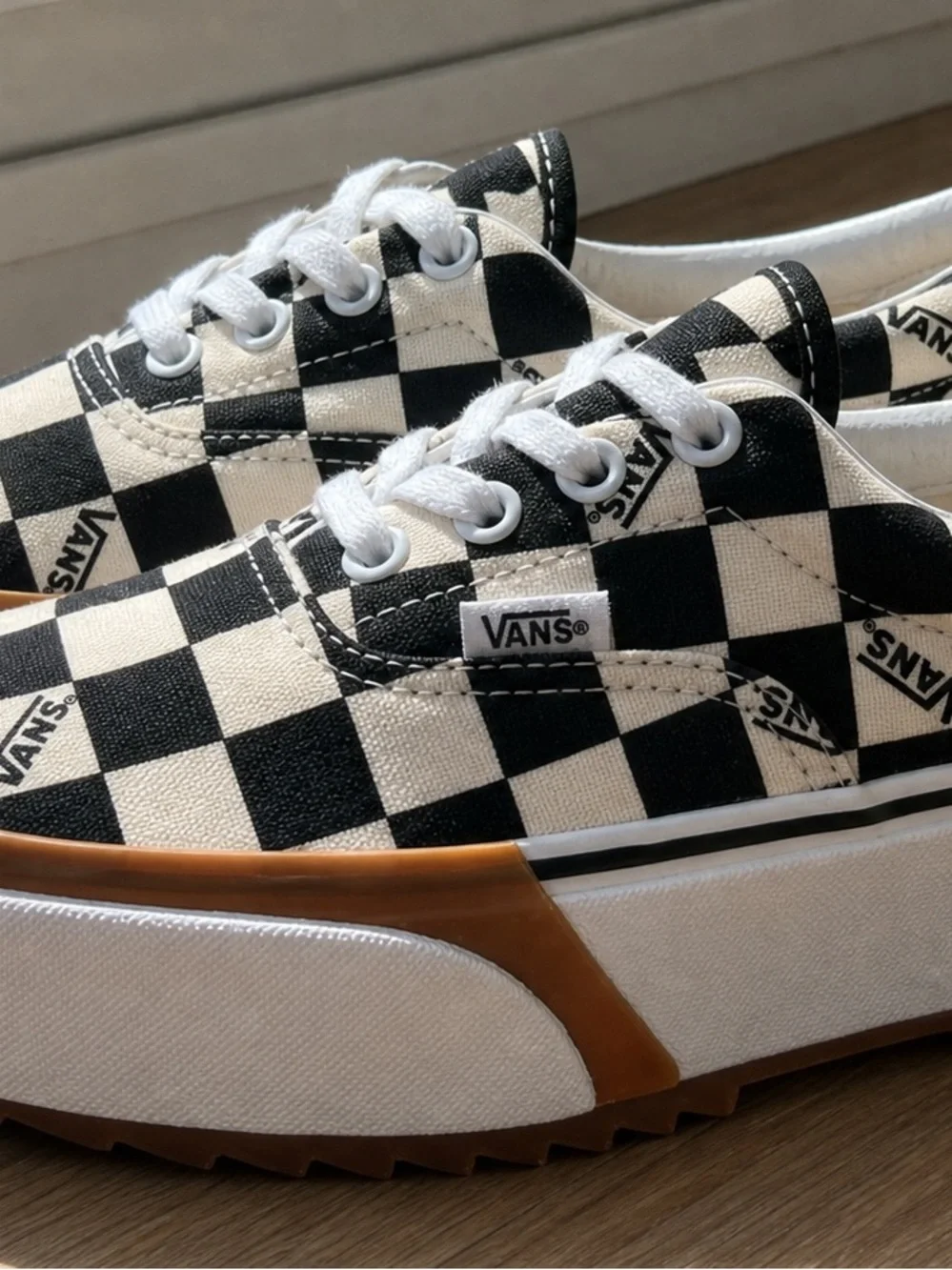 Vans Checkerboard Slip-On Sneakers in Black and White